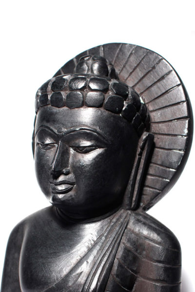 black stone blessed Buddha statue - close up