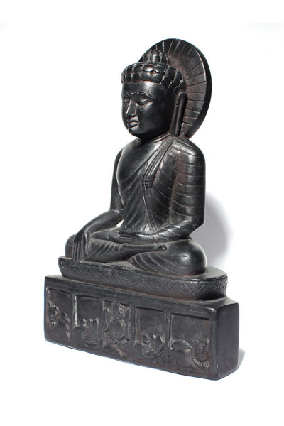 black stone blessed Buddha statue - side view