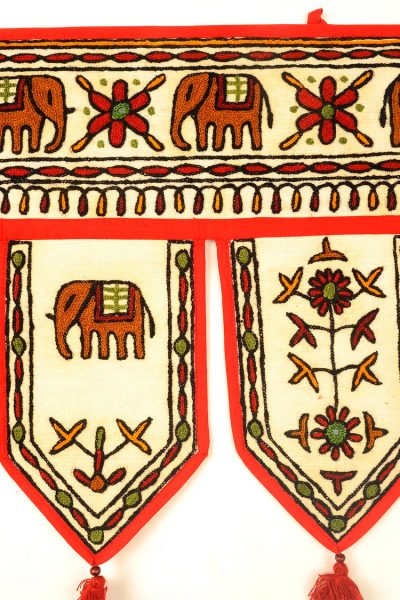 off white Gujarati embroidered toran door hanging - close up